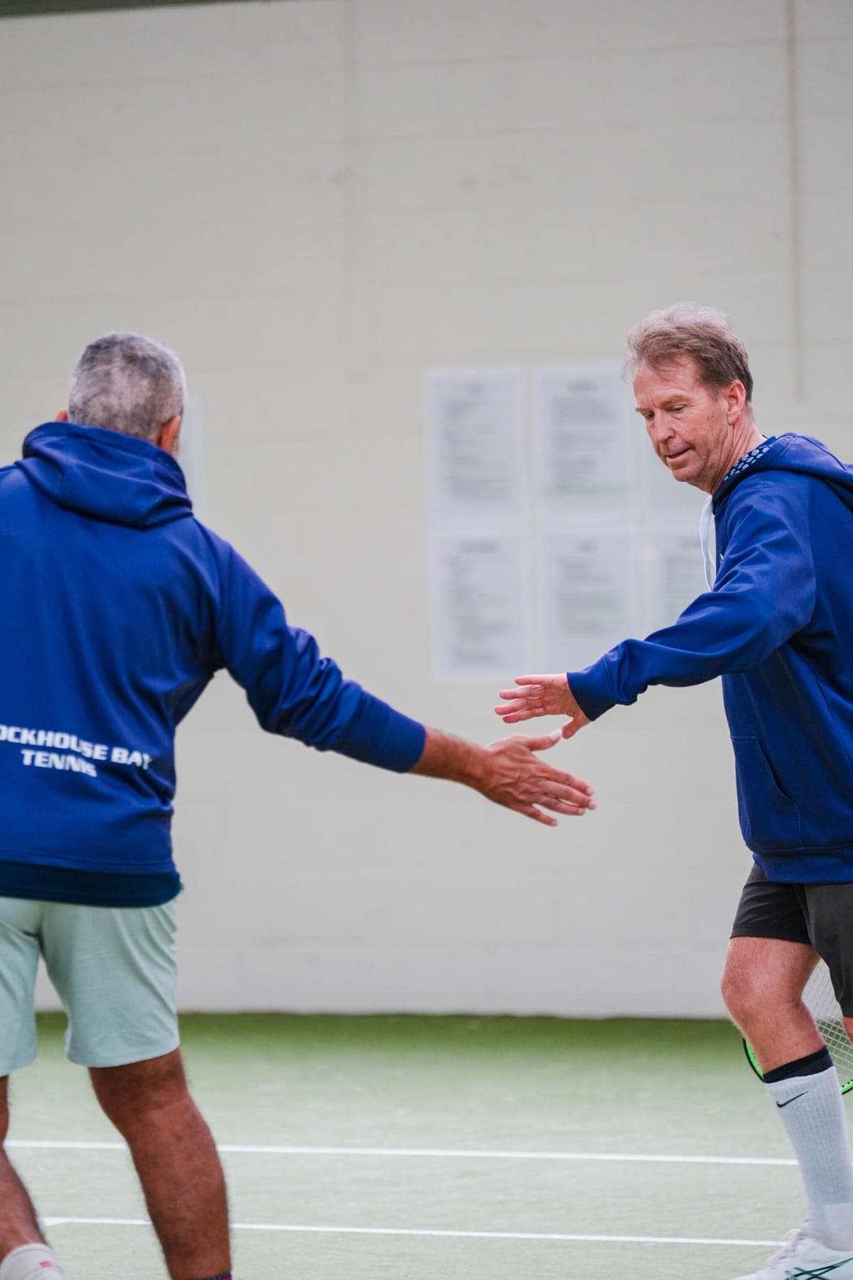 Pranil and John slapping hands